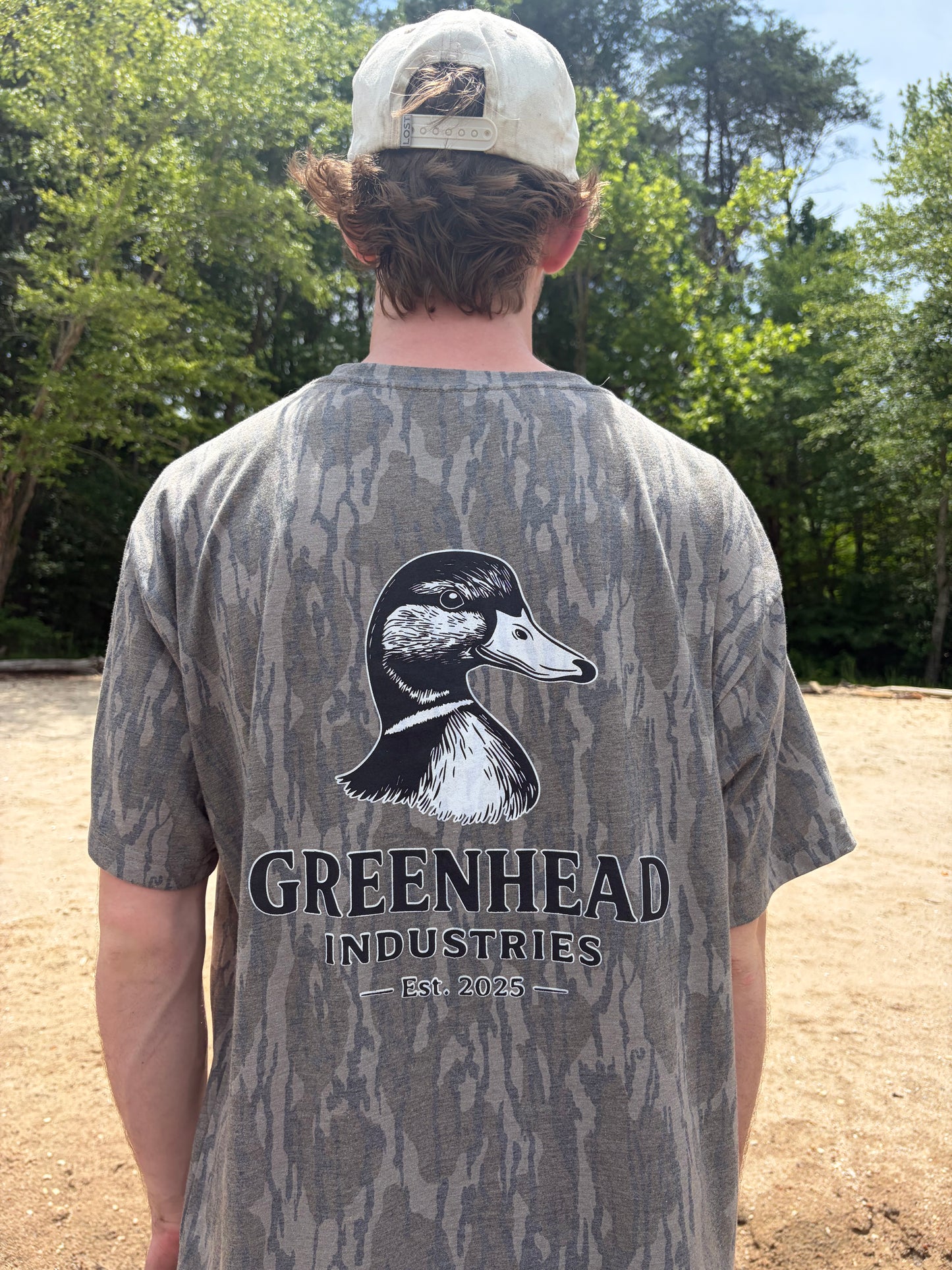 Duck head logo tee | Bottomland camo pattern|